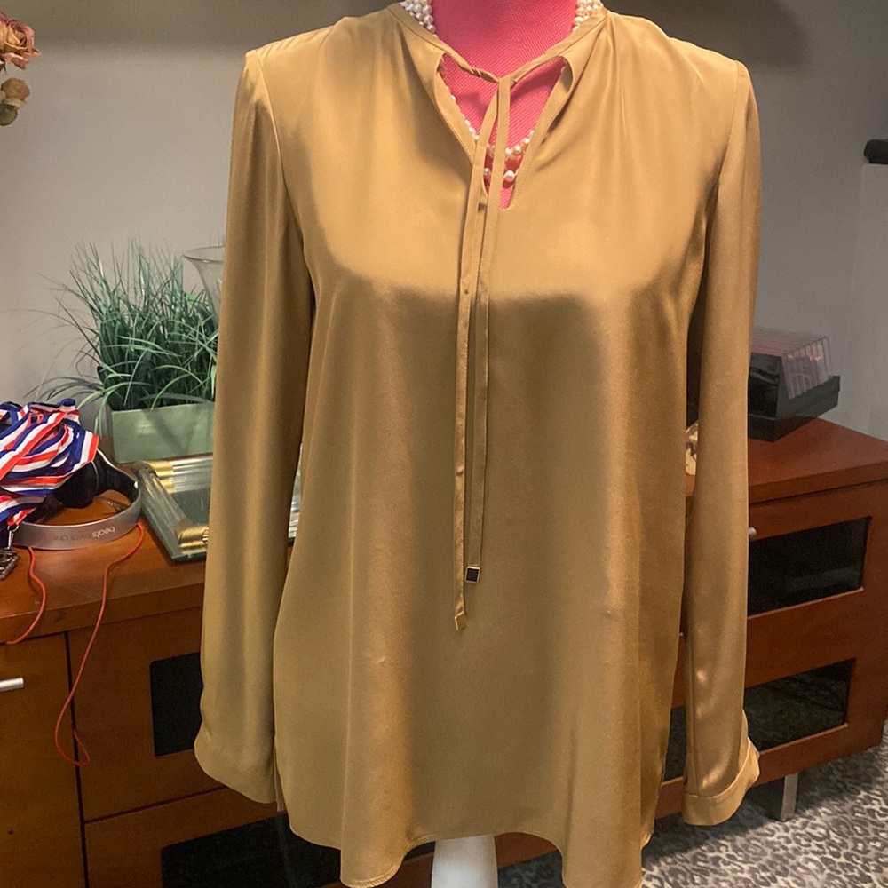 Beautifully designed silk blouse by high-end designer, Lafayette 148.